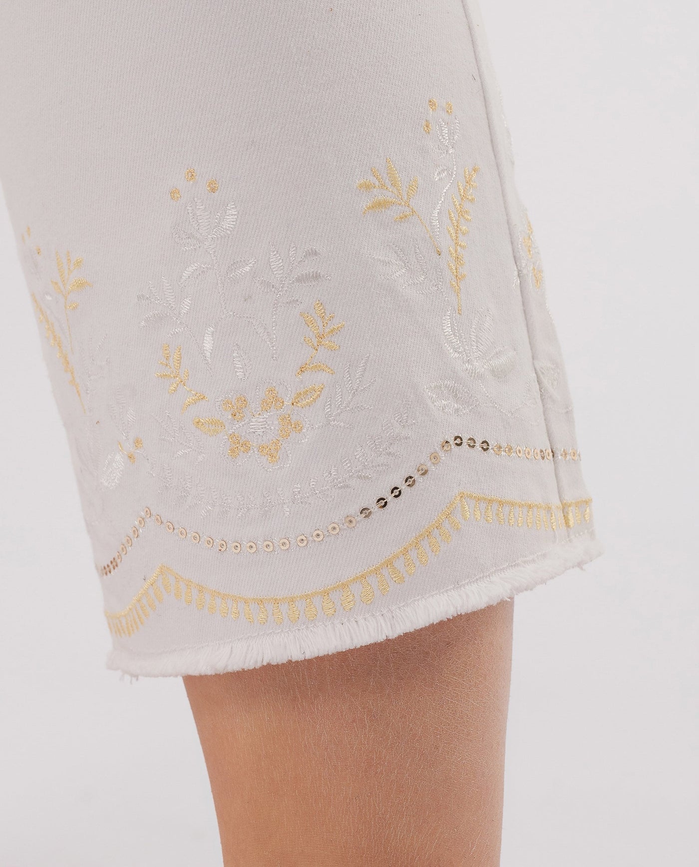 WHITE EMBROIDERED TROUSERS WITH HEM