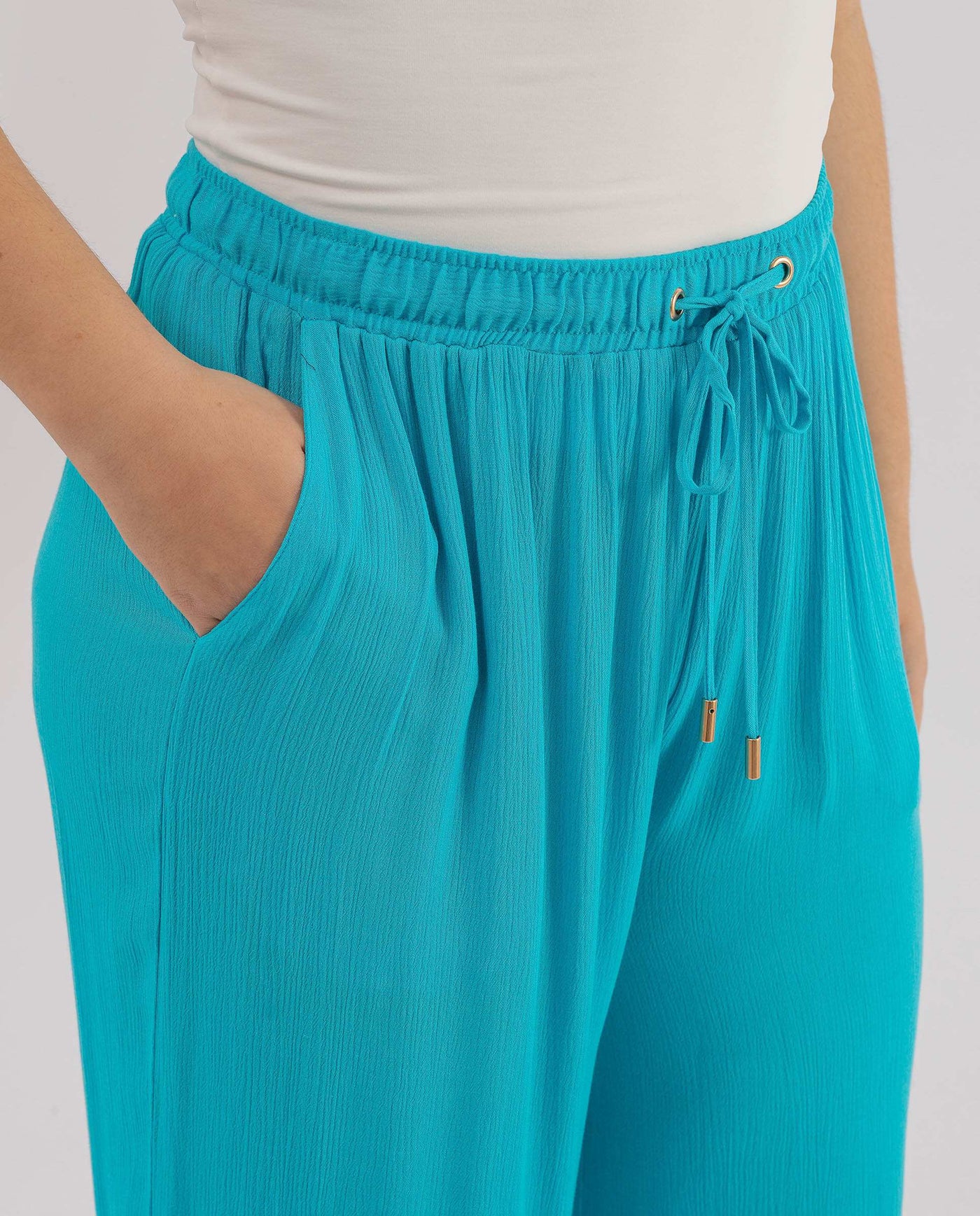 TURQUOISE FLOWING WIDE LEG TROUSERS
