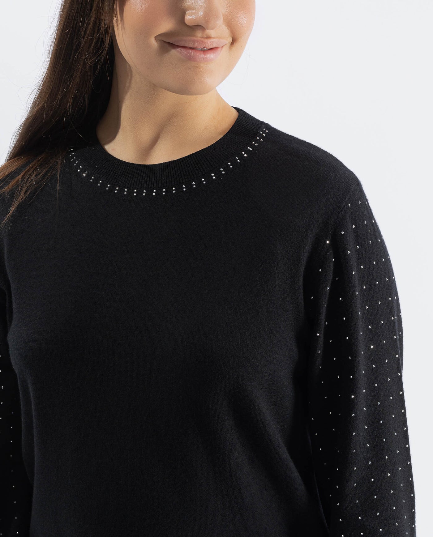 KNIT SWEATER WITH STUDDED SLEEVES AND BLACK SKIRT