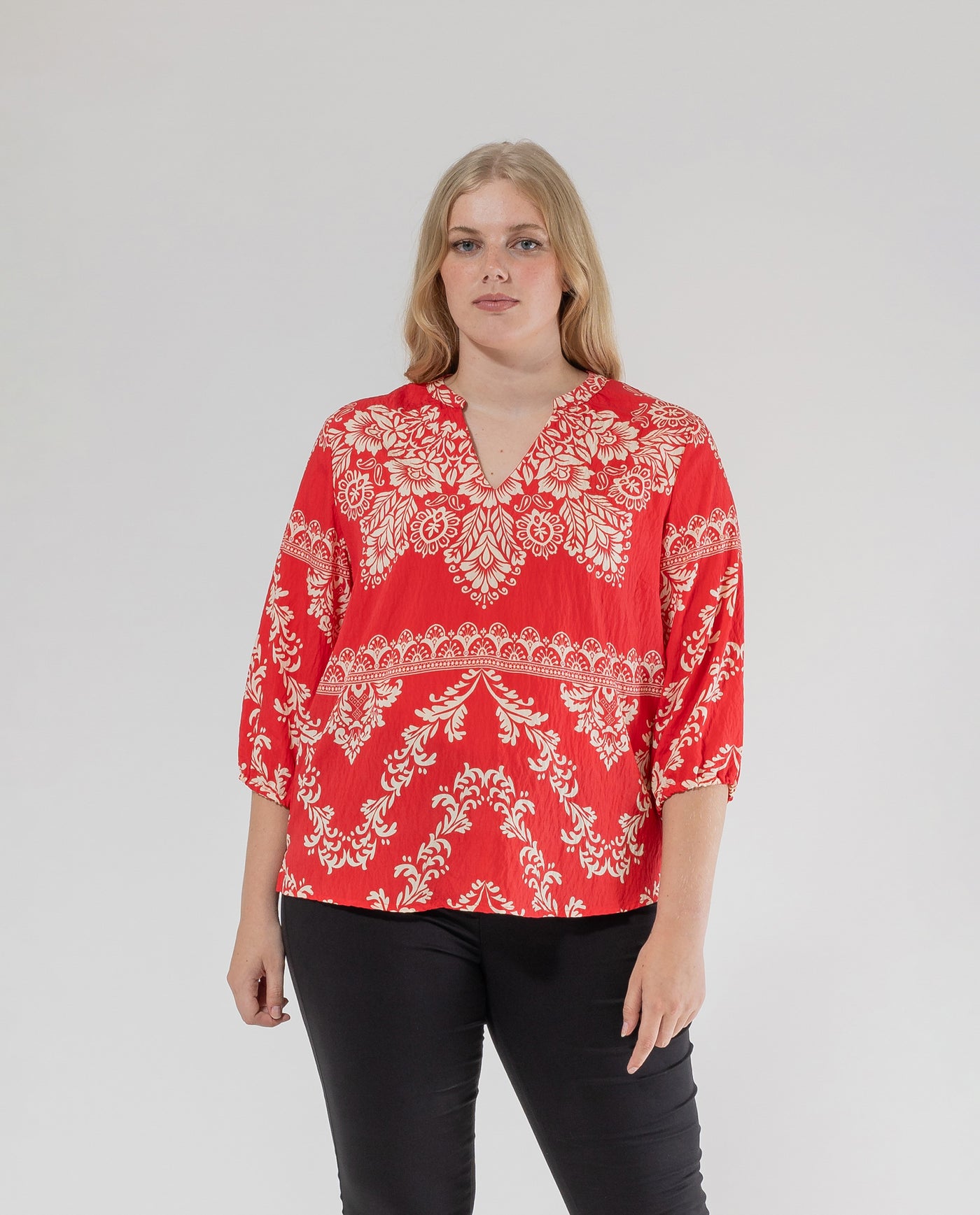 RED PRINTED V-NECK BLOUSE