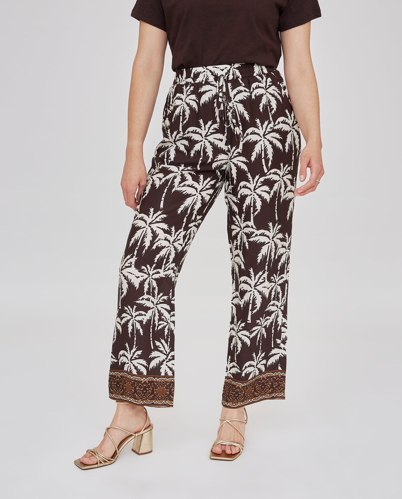 PANTALÓN RECTO ESTAMPADO CON CINTURA ELASTICA CRUDO