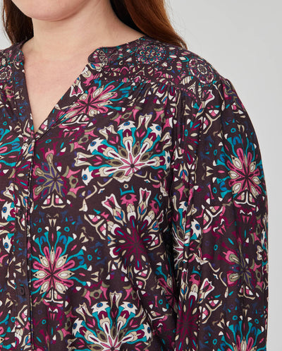 BLUSA CON ESCOTE PICO Y CANESU VIOLETA