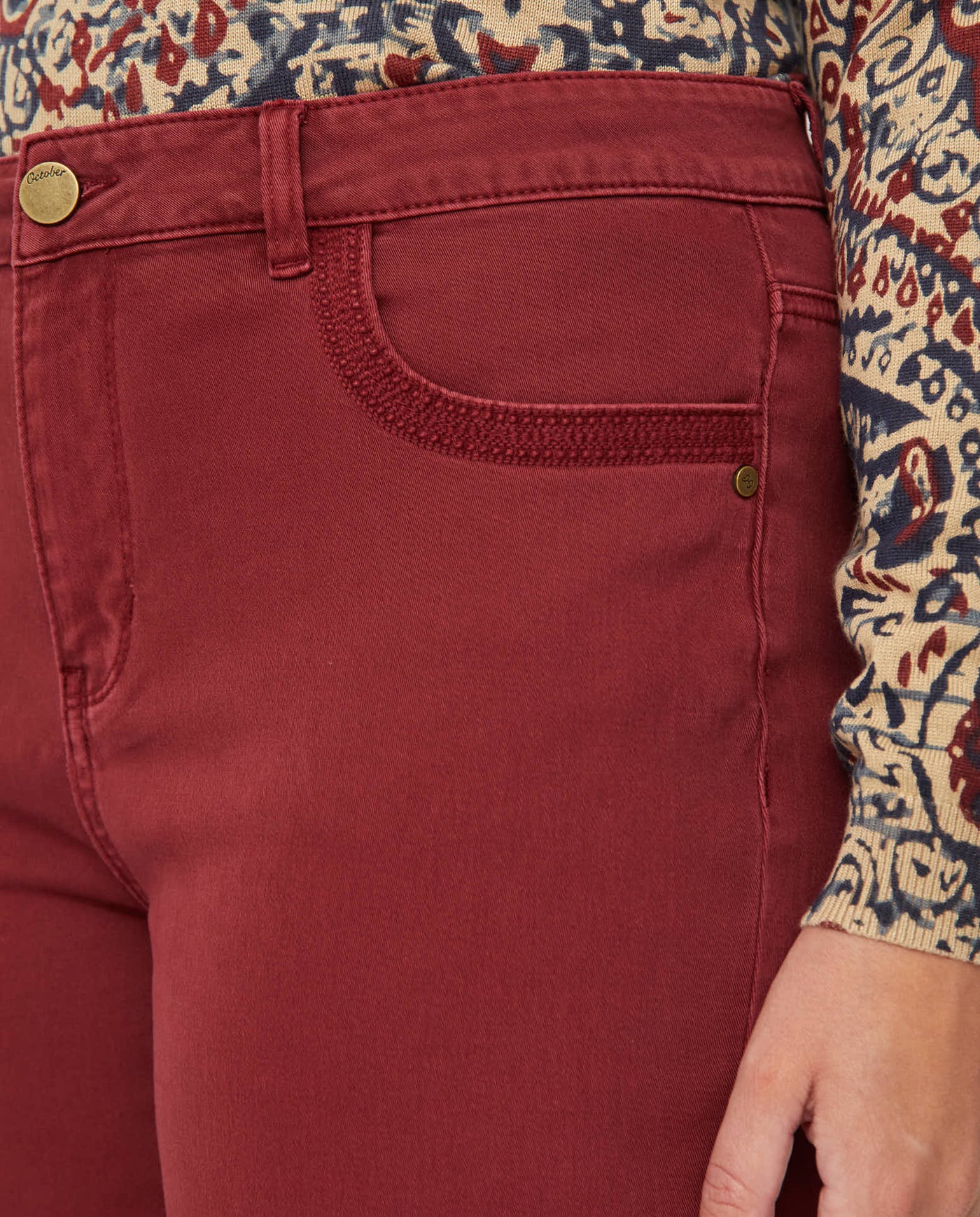 PANTALON CINCO BOLSILLOS BAJO EVASE GRANATE