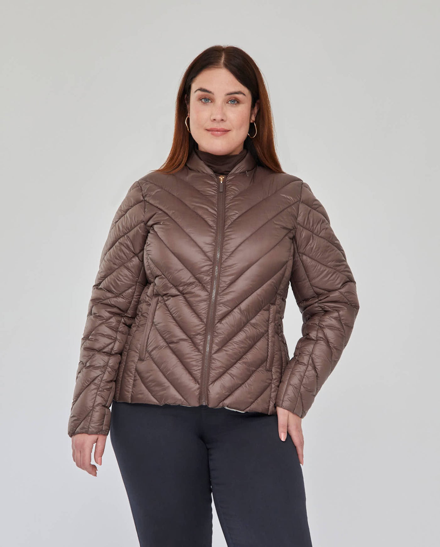 PARKA CORTA MANGA LARGA CON CAPUCHA OCULTA TOPO