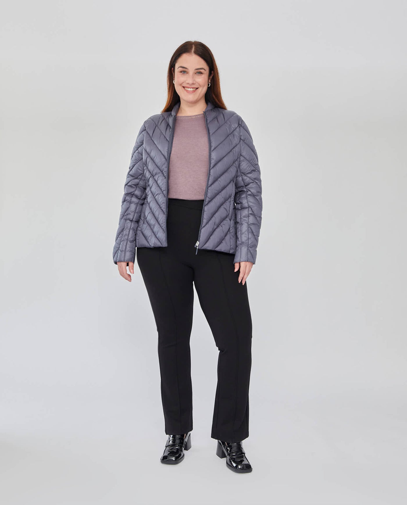 PARKA CORTA MANGA LARGA CON CAPUCHA OCULTA AZUL