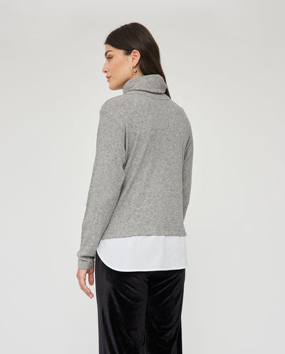 SUETER CUELLO SUBIDO CON FALDON  GRIS